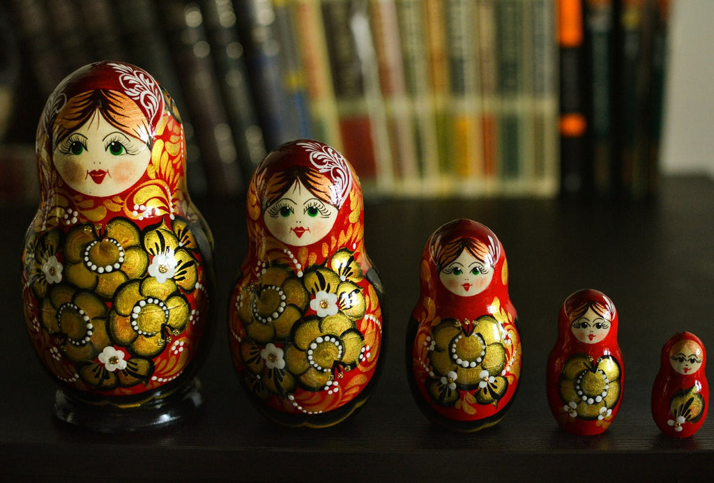 a-group-of-russian-nesting-dolls-sitting-on-a-table