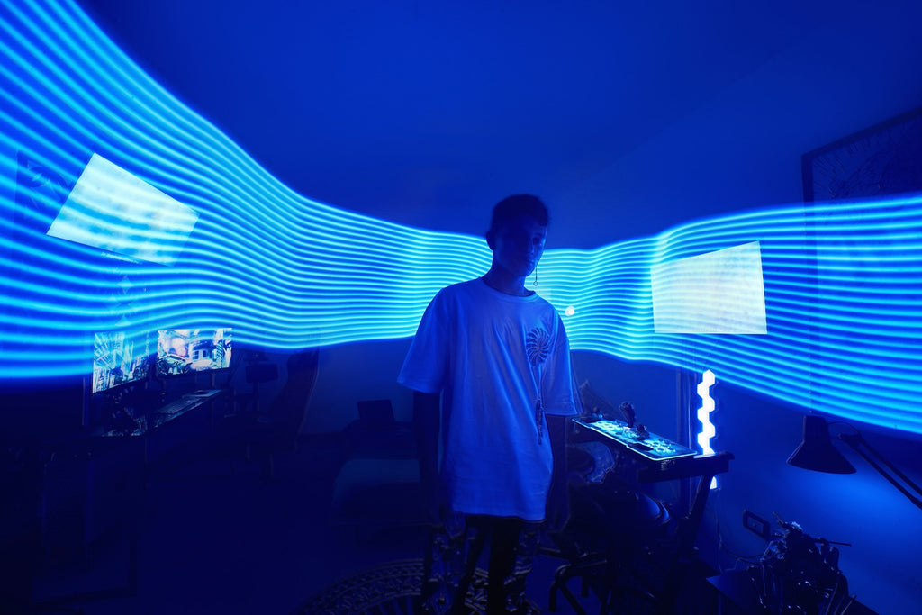 man-in-white-robe-standing-near-red-and-white-striped-tent-during-night-time