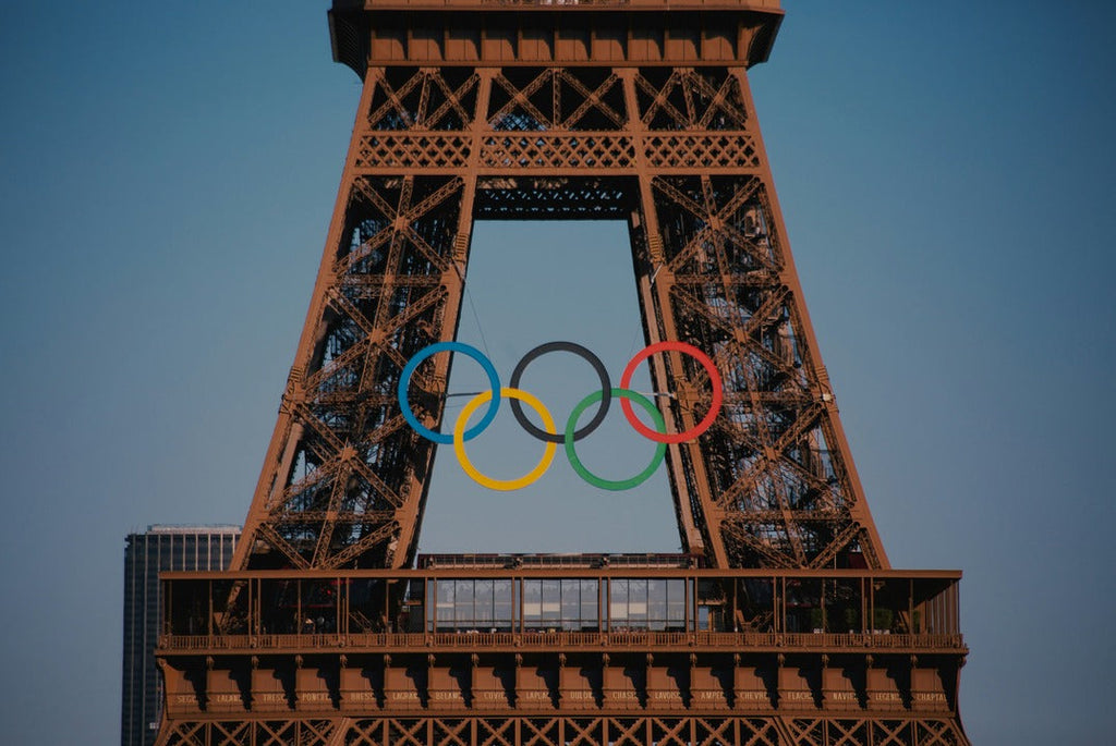 the-eiffel-tower-with-the-olympic-rings-in-front-of-it