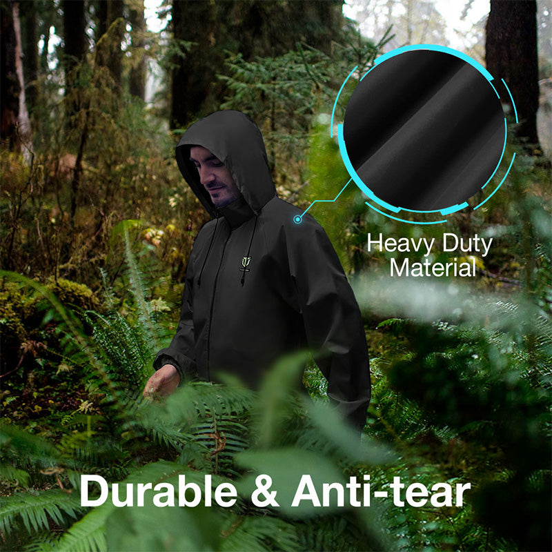 Man wearing black jacket in a forest, showcasing the 270 Degree 3 Full Panels See Through Hunting Blind and Rain Suit Bundle for outdoor hunting.